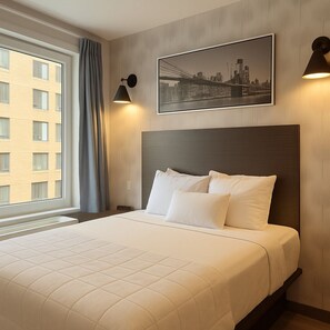 Habitació Deluxe | 1 dormitori, cobrellits, matalassos d'escuma viscoelàstica i escriptori 