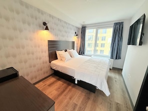 Down comforters, memory foam beds, desk, laptop workspace