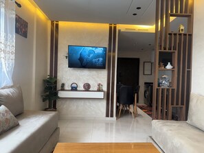 Living area - Charming 1-bedroom apartment in Mehdya  with AC, WiFi (Kenitra)