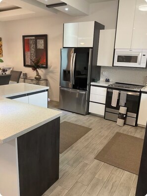 Fridge, microwave, oven, stovetop - Charming Brand New 3-bedroom townhome in between Mission and McAllen area. (McAllen)
