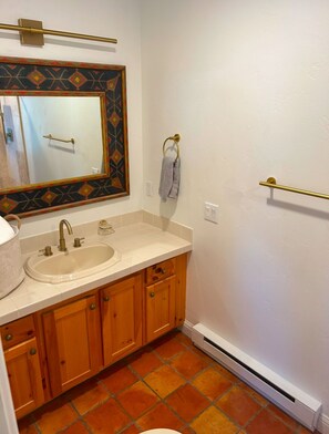 Shower, towels, soap, toilet paper