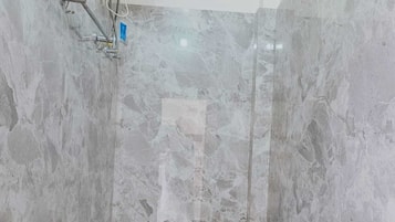 Deluxe Double Room, City View | Bathroom | Shower, free toiletries, hair dryer, slippers