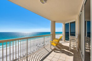 A balcony with a view of the beach and ocean. - Silver Beach Towers 1003 West (Destin)