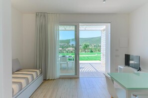 Apartment, 1 Bedroom, Balcony | Living area - Stunning Capo Falcone Charming Apartments num 5089 (Stintino)