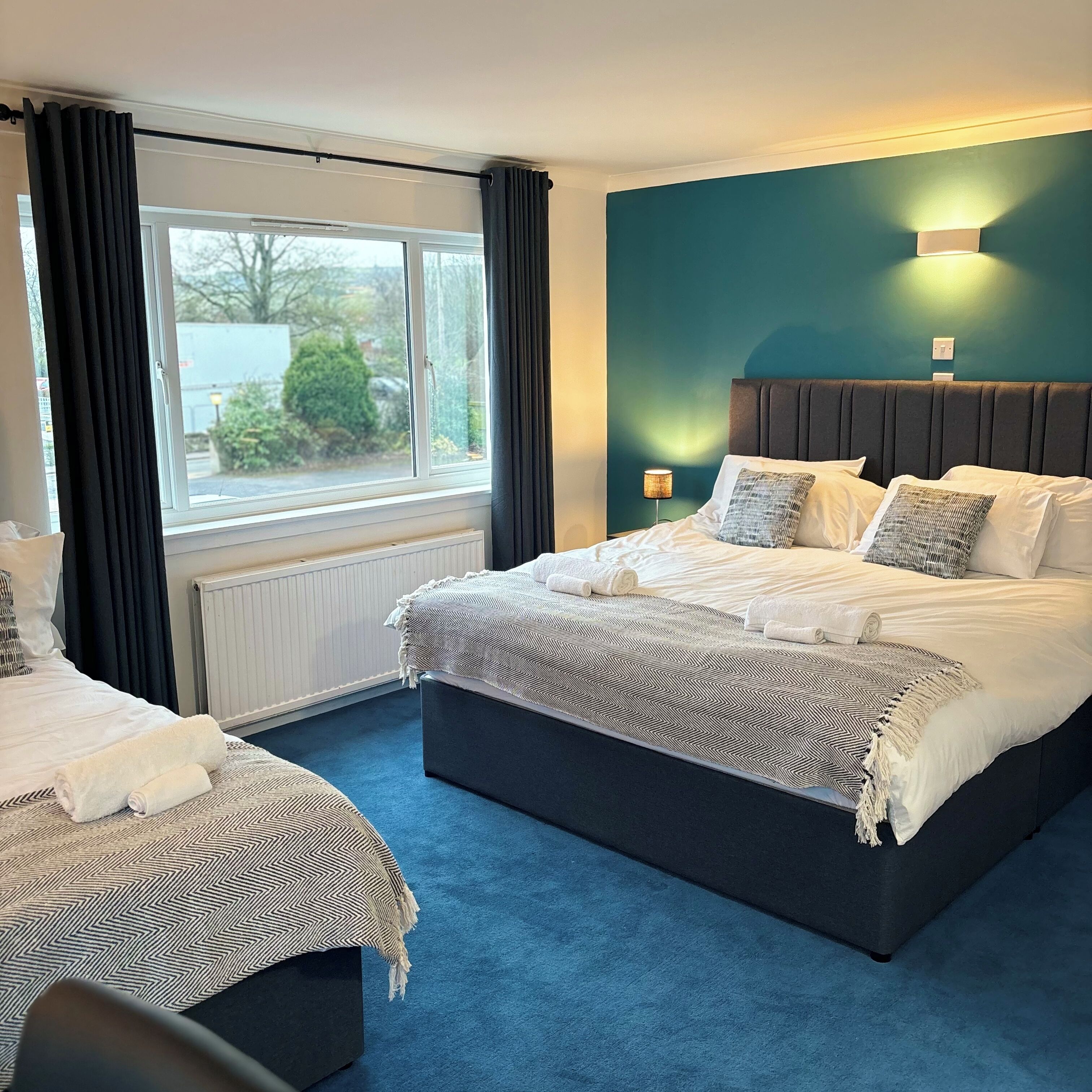 Premium bedding, Select Comfort beds, desk, laptop workspace