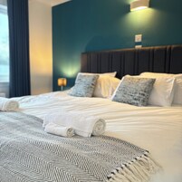 Premium bedding, Select Comfort beds, desk, laptop workspace