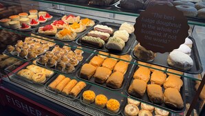 A bakery display case with various pastries and desserts. - Lomond Hills Hotel & Health Club  (Cupar)