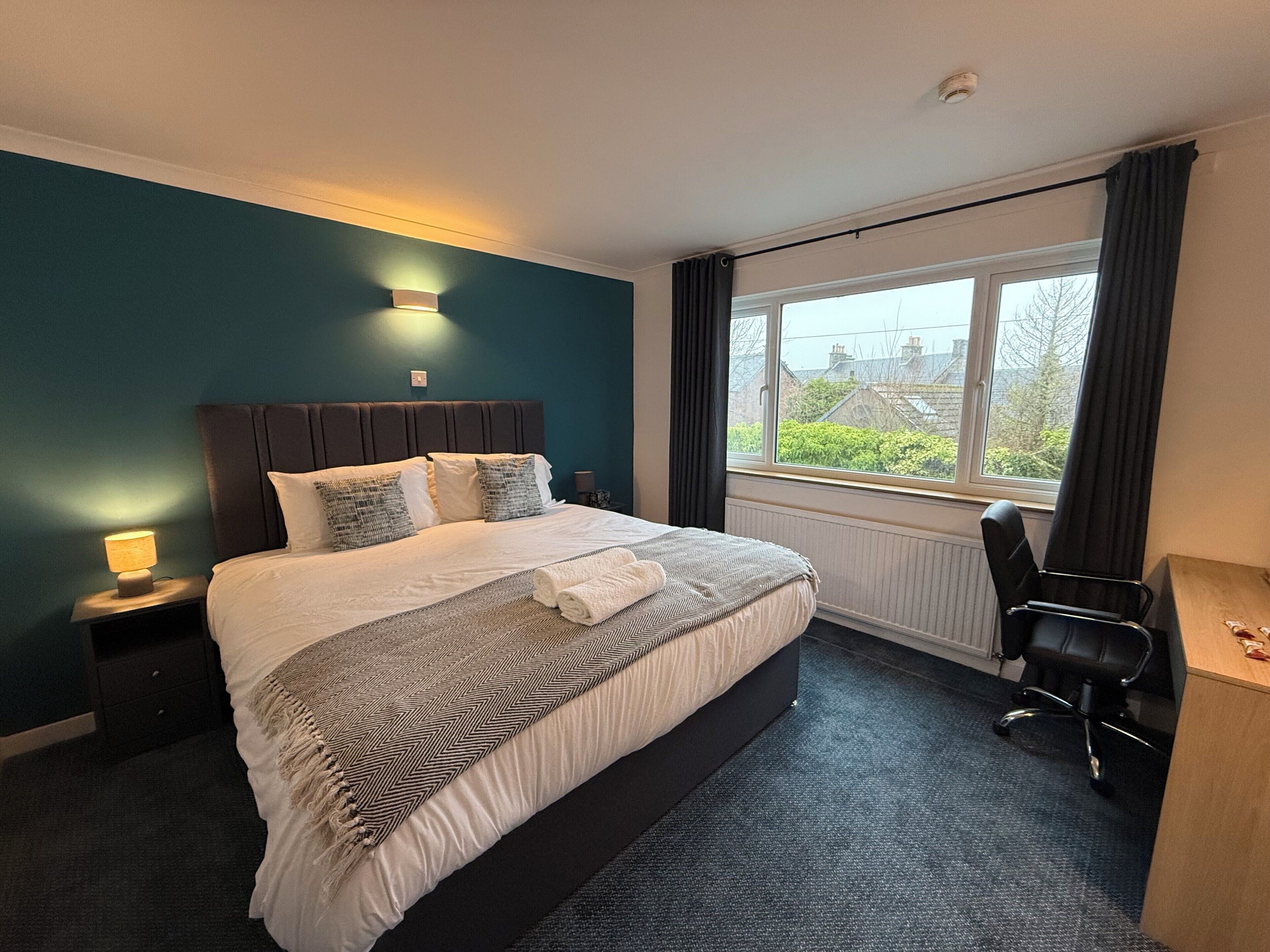 Premium bedding, Select Comfort beds, desk, laptop workspace