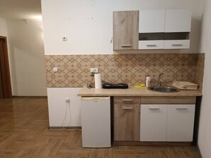 Apartment, 1 Bedroom, Smoking, Balcony | Interior - Family Apartment in the Complex (Bar)