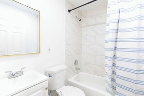 Hair dryer, towels, soap, toilet paper