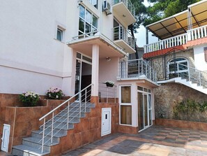 Apartment, 1 Bedroom, Smoking, Balcony | Exterior - An Apartment in a Complex in a Pine Forest (Bar)