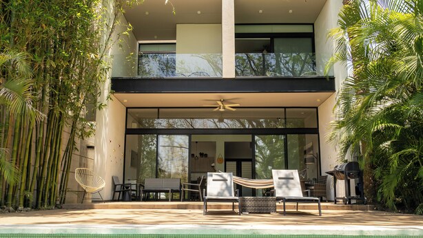 A modern house with a pool, outdoor furniture, and a hammock. - New House in Santa Fe Morelos (Xochitepec)