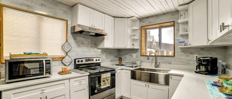Fridge, microwave, stovetop, coffee/tea maker