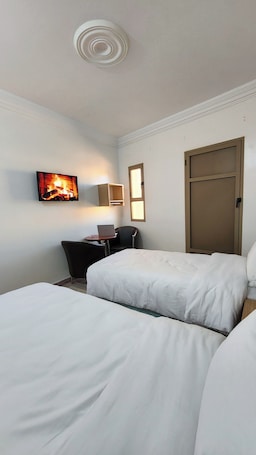 Standard Room, City View | Pillowtop beds, laptop workspace, free WiFi, bed sheets