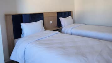 Colchones con pillow-top y espacio para trabajar con laptop