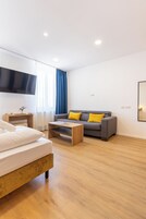 Studio | Desk, laptop workspace, blackout drapes, cribs/infant beds