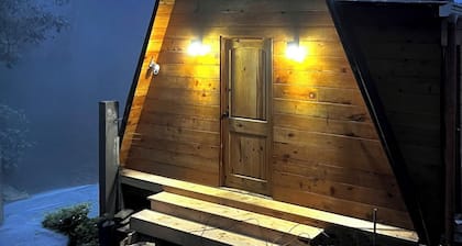 Cabina Alpina en el Bosque