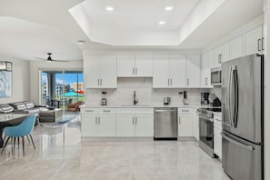 Superior 3-Bedroom, Apartment, Bedroom 1: 1 King, Bedroom 2: 1 King, Bedroom 3: 2 Twin bunk | Private kitchen | Coffee/tea maker - Villatel Orlando Resort, Apartments by Marriott Bonvoy (Orlando)