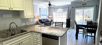 First Floor Updated Coastal Summer Retreat at Magnolia Place - Pool View
