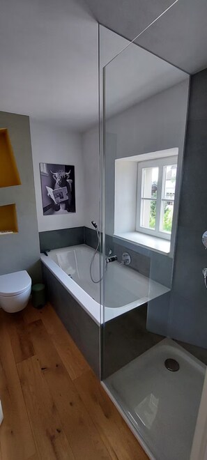 Shower, hair dryer, towels, soap