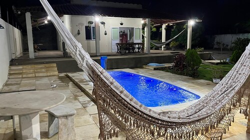 Airy house with swimming pool, 5 minutes from Farol beach. The perfect getaway!