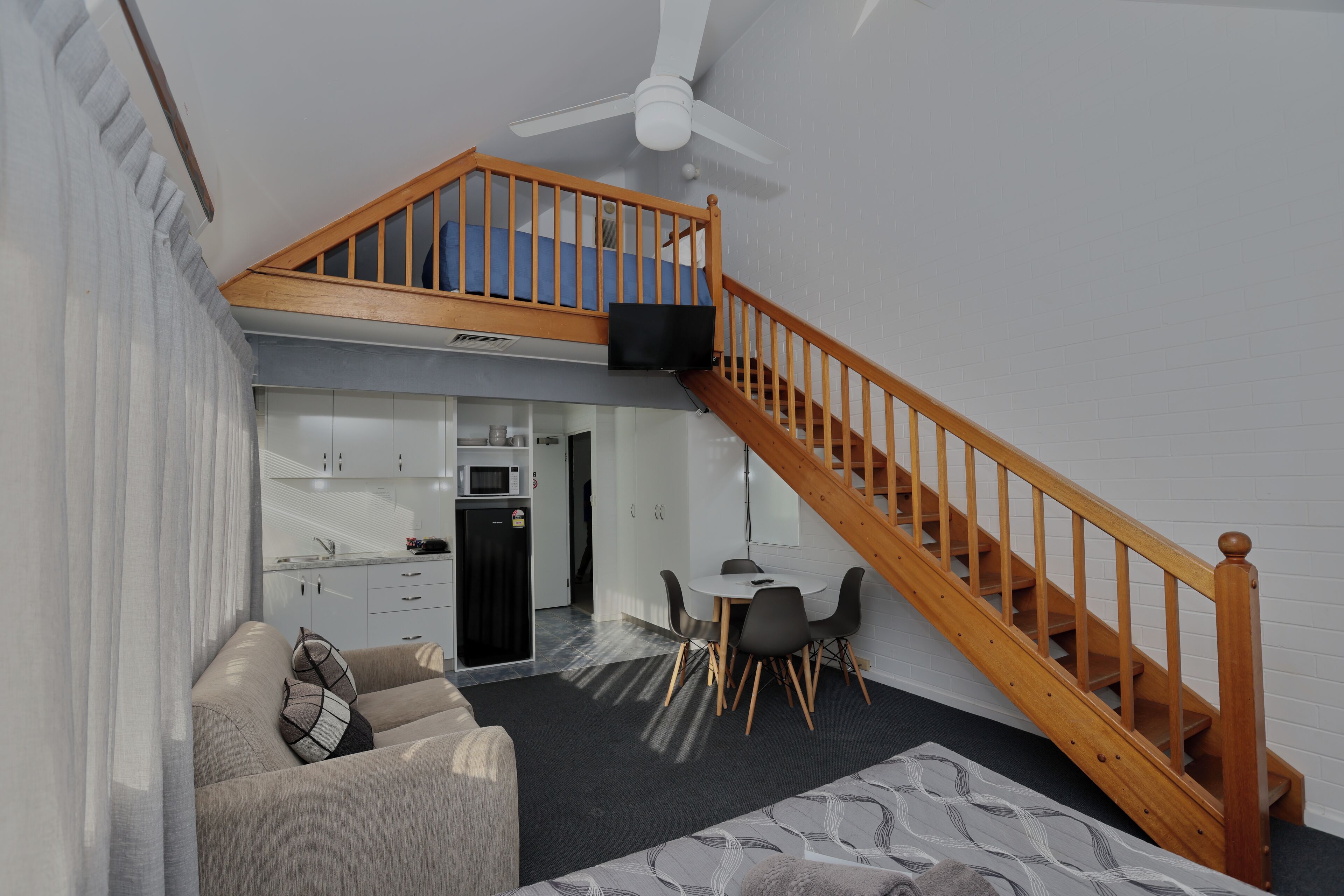 Executive Family Loft Suite | Living area | TV