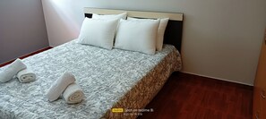 2 habitaciones, tabla de planchar con plancha y wifi gratis
