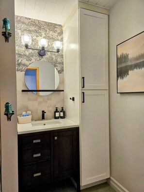 Hair dryer, towels, soap, toilet paper