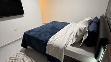 3 slaapkamers, een bureau, een strijkplank/strijkijzer, wifi