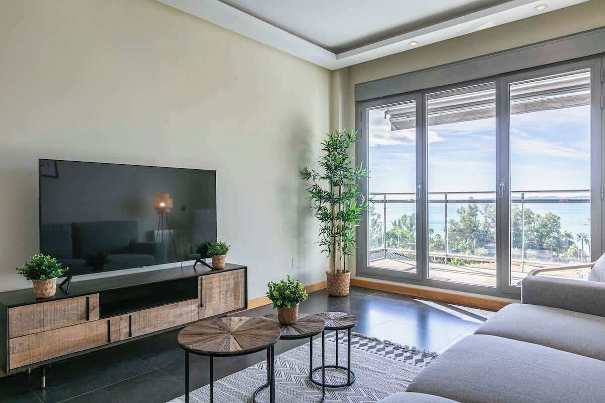 Bright living room with sea views