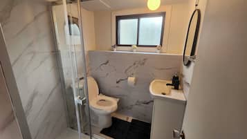 Hair dryer, towels, soap, toilet paper