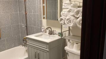 Hair dryer, towels, soap, toilet paper