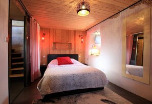 1 habitación, tabla de planchar con plancha y cuna de viaje