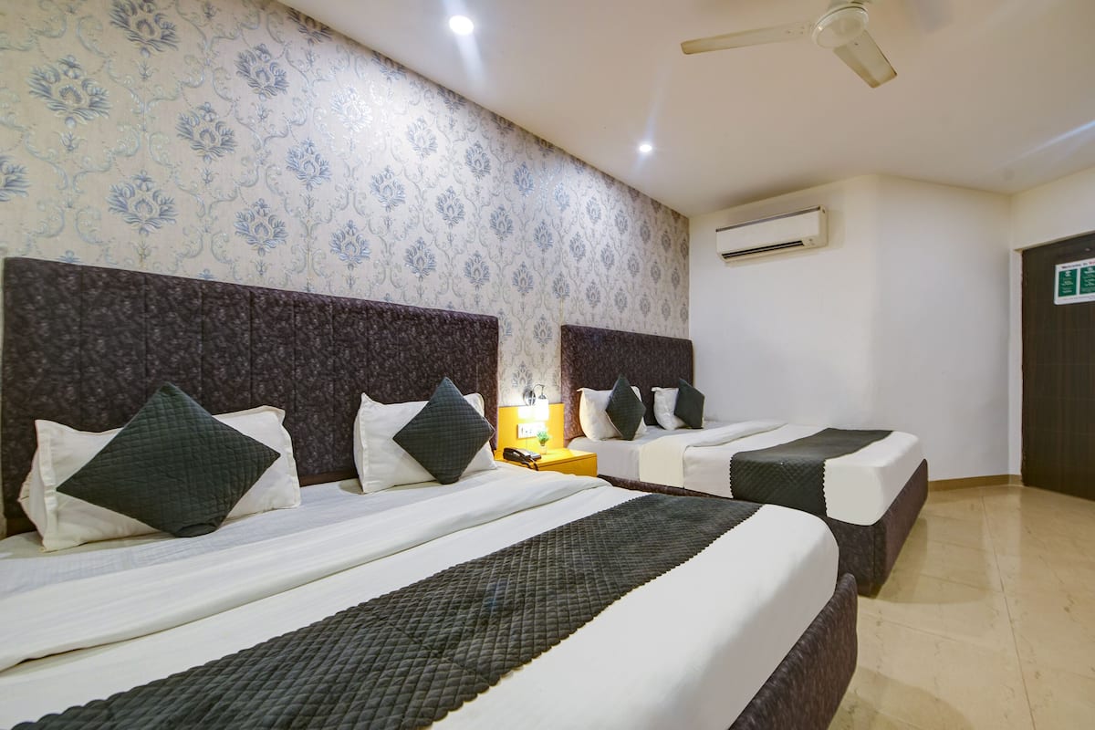 Family Quadruple Room | In-room safe, individually decorated, individually furnished, desk