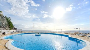 A pool with a clear view of the sea and a rocky cliff. - Ocean Loka by Interhome (Callao Salvaje)