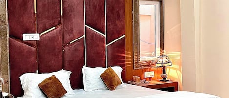 Deluxe Double Room, City View | Desk, laptop workspace, soundproofing, iron/ironing board