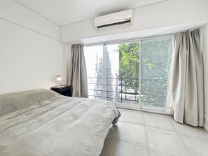 1 dormitorio, tabla de planchar con plancha, Internet y ropa de cama