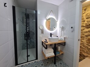 Shower, hair dryer, towels, soap