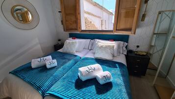 2 habitaciones, tabla de planchar con plancha, wifi y ropa de cama