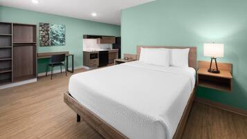 Desk, laptop workspace, free WiFi, bed sheets