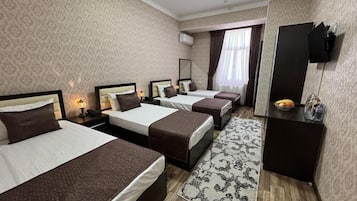 Comfort Triple Room, Courtyard View | Premium bedding, in-room safe, blackout drapes, soundproofing