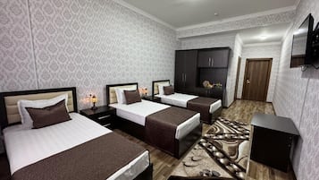 Comfort Triple Room, Courtyard View | Premium bedding, in-room safe, blackout drapes, soundproofing