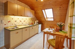 Fridge, stovetop, coffee/tea maker, electric kettle