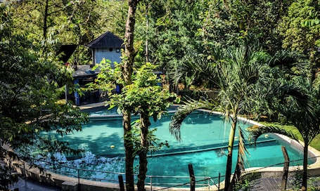 Outdoor pool. Ambalama Leisure Lounge