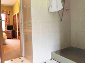 Shower, hair dryer, towels