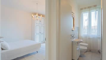 Apartment (2 Bedrooms) | Bathroom | Shower, bidet, towels, soap