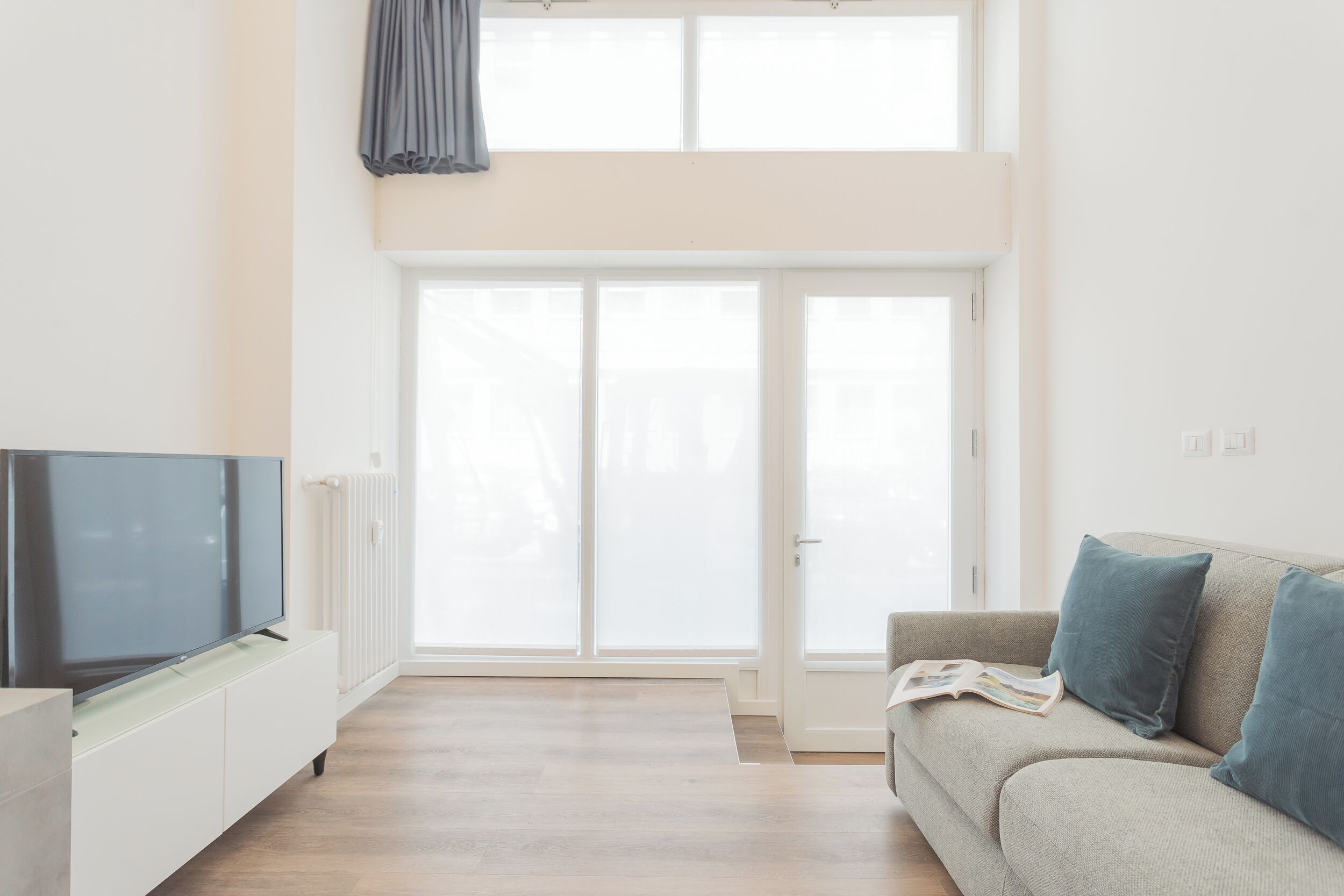 Apartment (1 Bedroom) | Living area | 32-inch flat-screen TV with satellite channels