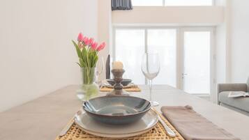 Apartment (1 Bedroom) | Living area | 32-inch flat-screen TV with satellite channels