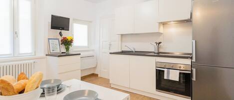 Apartment (2 Bedrooms) | Private kitchenette | Oven, espresso maker, electric kettle, highchair