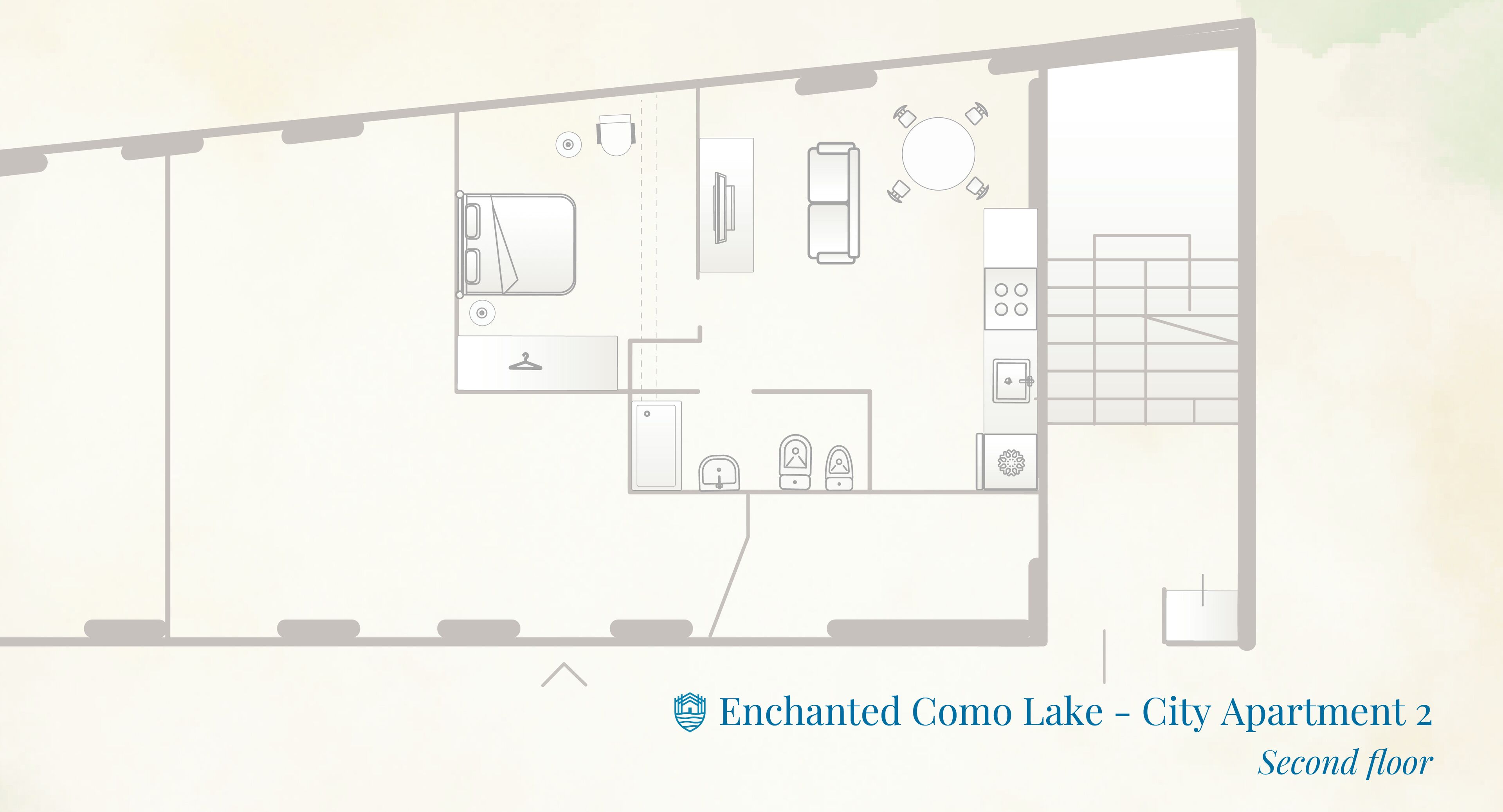 A floor plan of Enchanted Como Lake - City Apartment 2 on the second floor, including a kitchen, dining area, and bathroom.